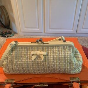 A New Day Clutch Bag with single handle